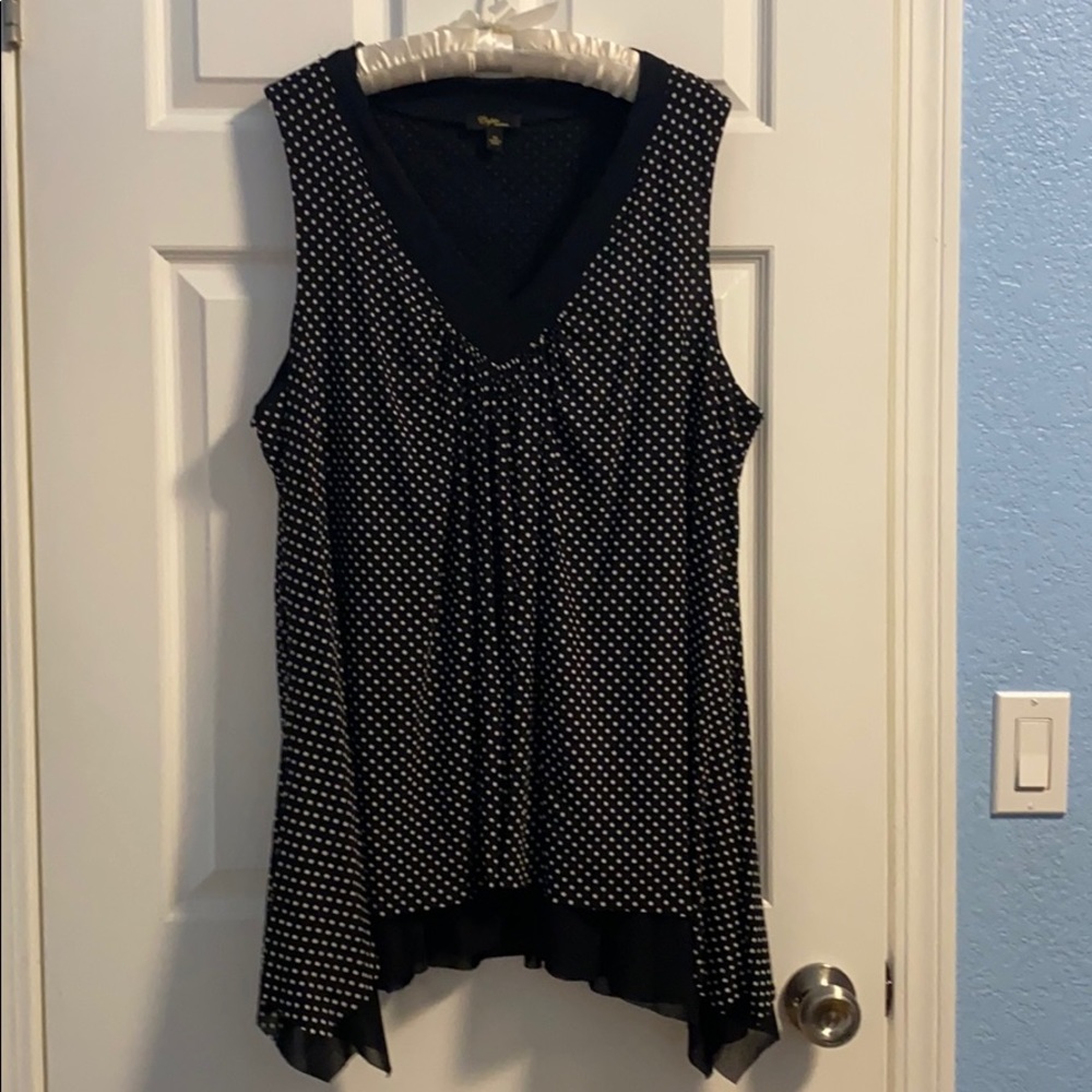 Polka dot top with ruffles.